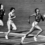 Wilma Rudolph running across the finish line.